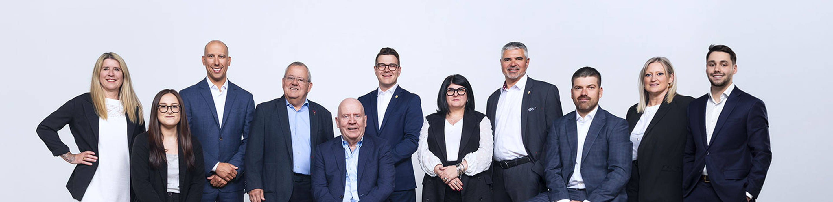 A group shot of The Colbert Group.