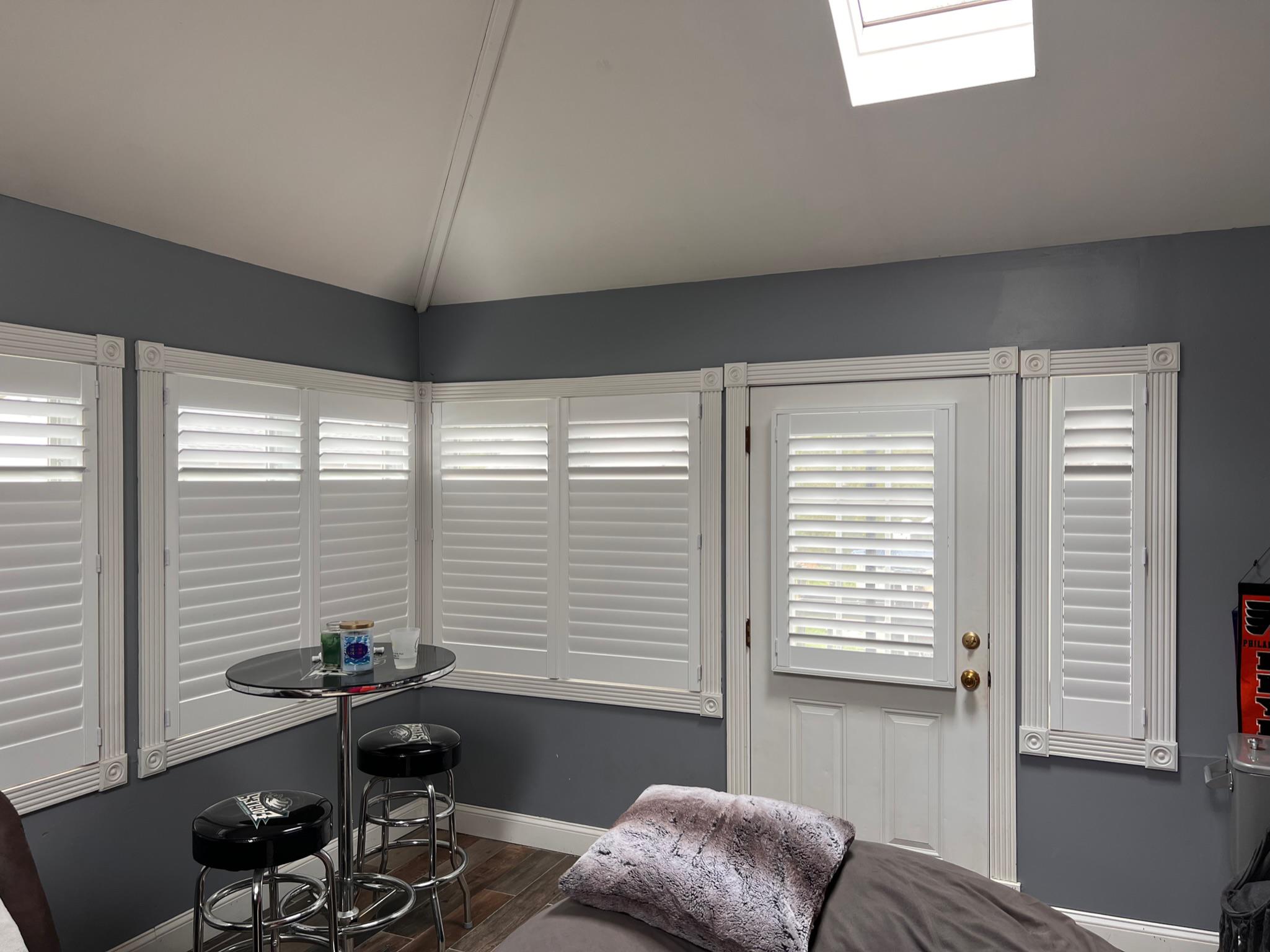 Shutters are for doors, as well as windows, as seen here in this Jenkintown, PA living room.