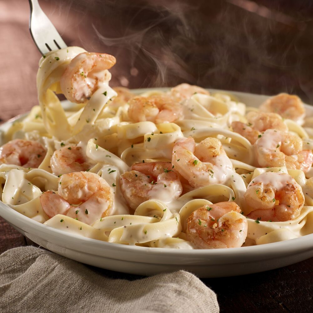 Shrimp Alfredo: Fettuccine alfredo tossed with sauteÌed shrimp.