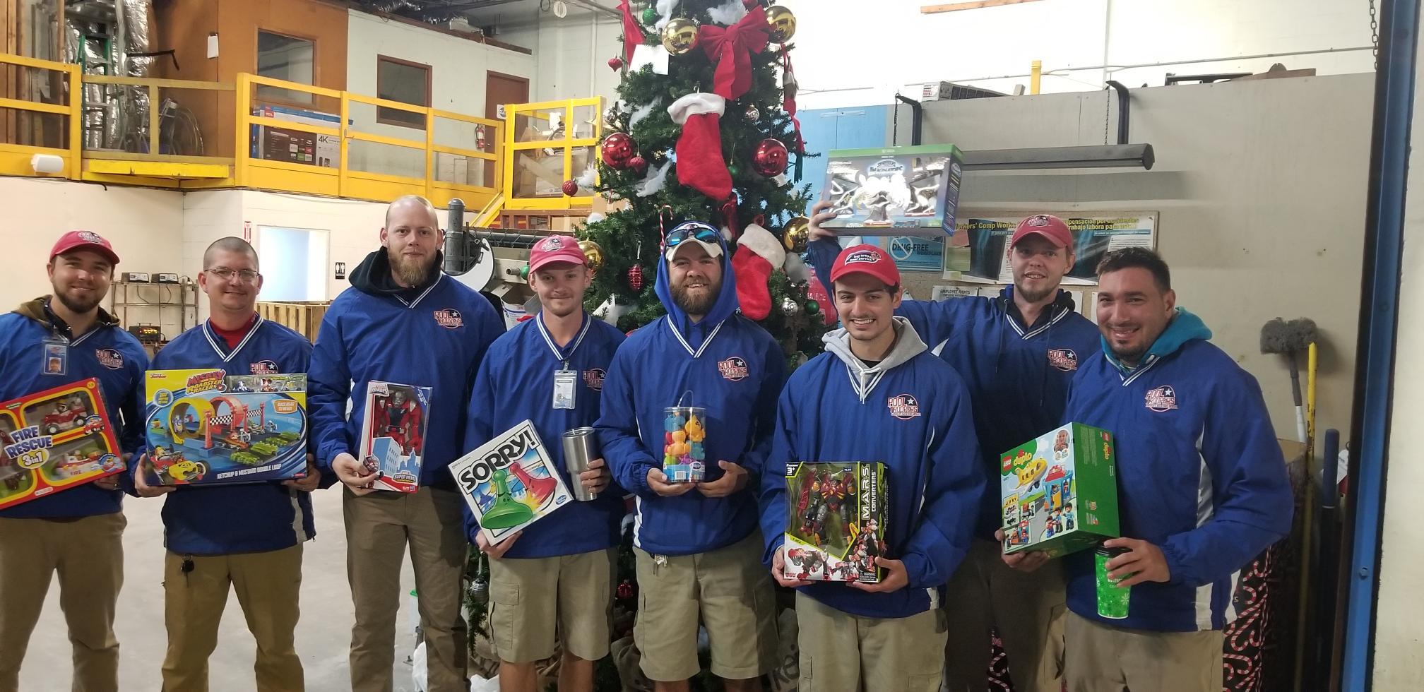 Pool Troopers Staff Participating in Toys for Tots Pool Troopers Cypress (281)358-1876