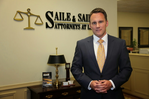 Attorney Michael Saile, Jr. standing in the office lobby