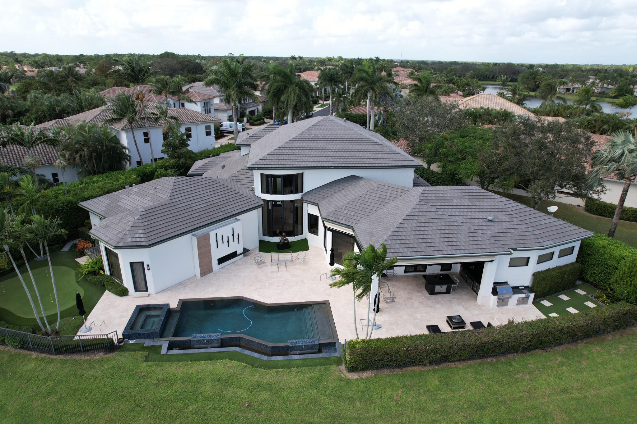We replaced this roof and installed flat tiles from Eagle. This roof tile color is called Sierra Madre. This roof also has mitered hips and ridges for a seamless look.