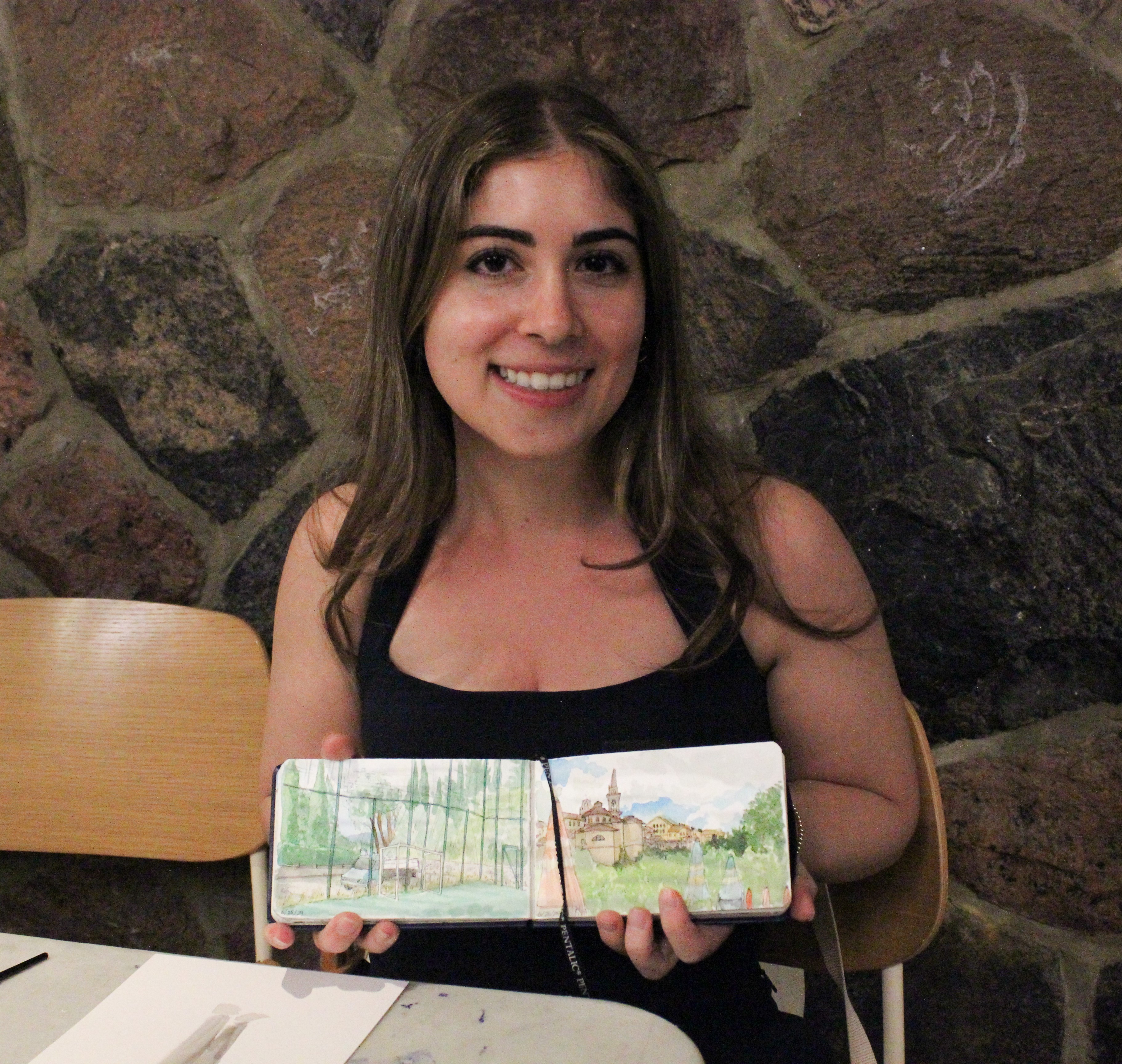 olivia with flip book.jpg