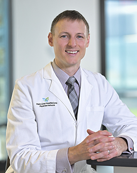 Headshot of Christopher Hartman, MD, MBA