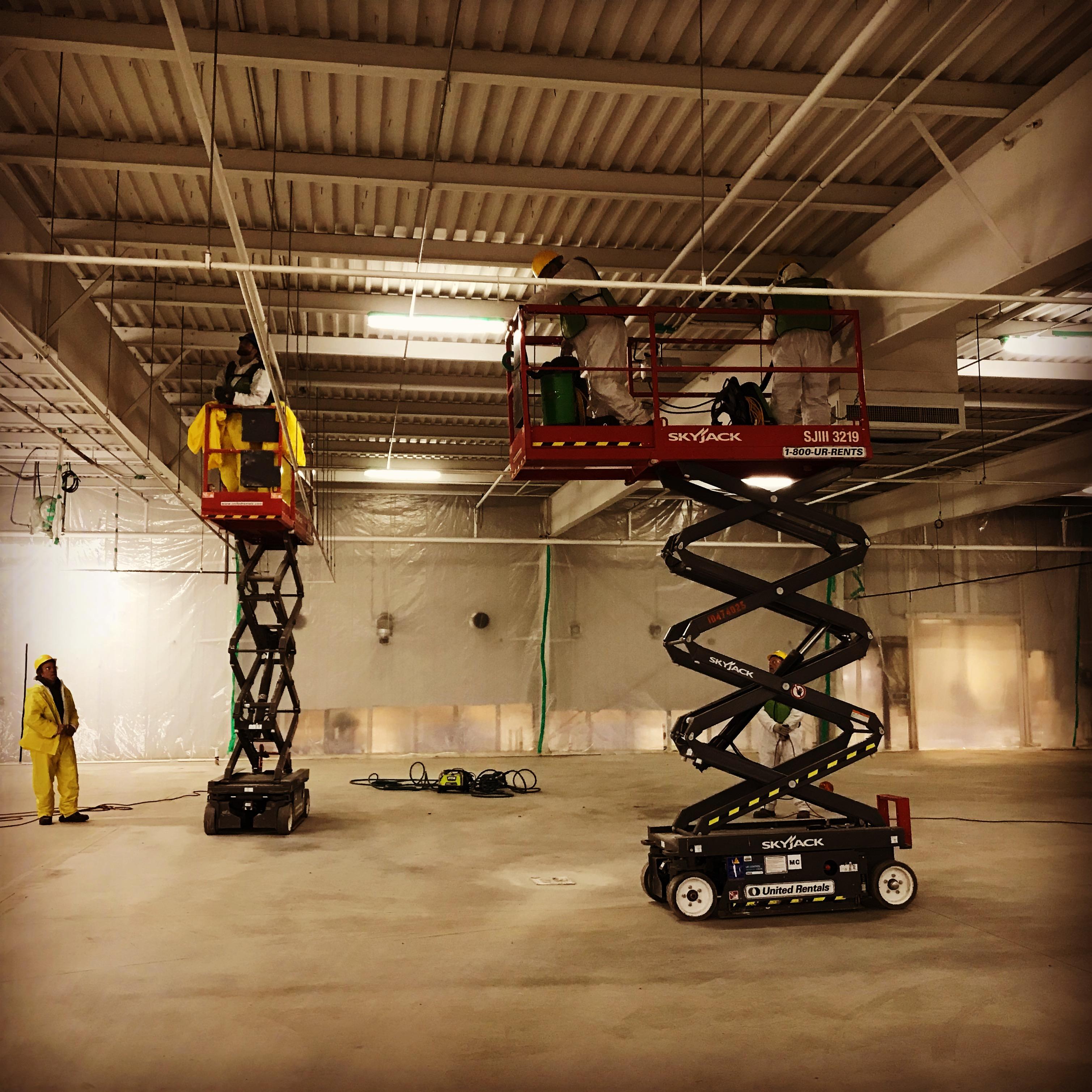 You can't be afraid of heights with SERVPRO! Our team is working hard on a commercial job.