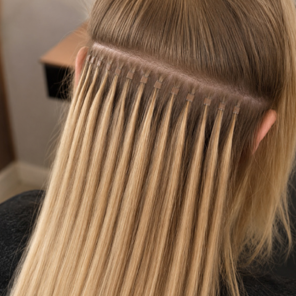 Nano bead hair extensions professionally installed at Avissa Salon in Ann Arbor for added length, vo 