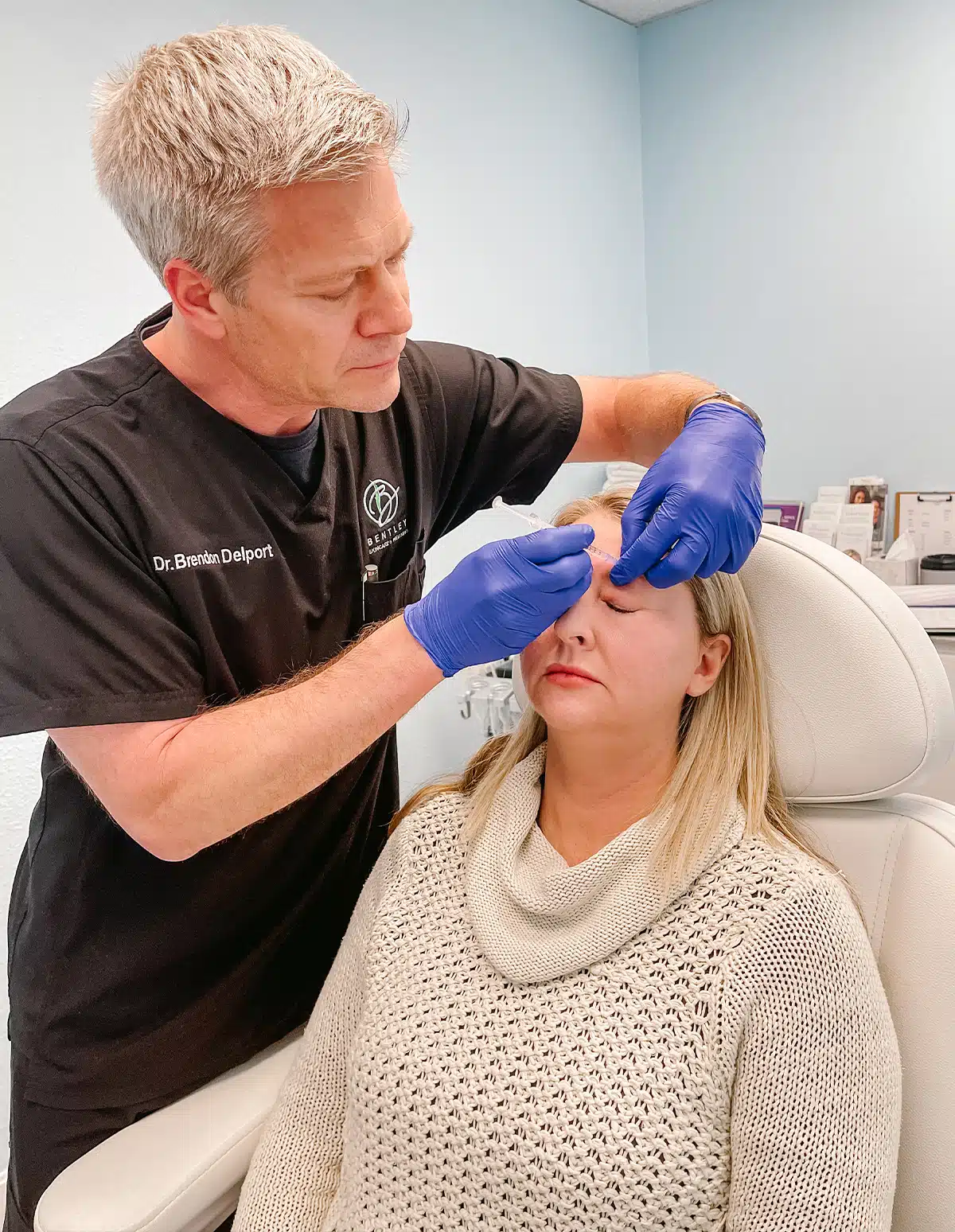 Dr. Brendon Delport performing botox injections