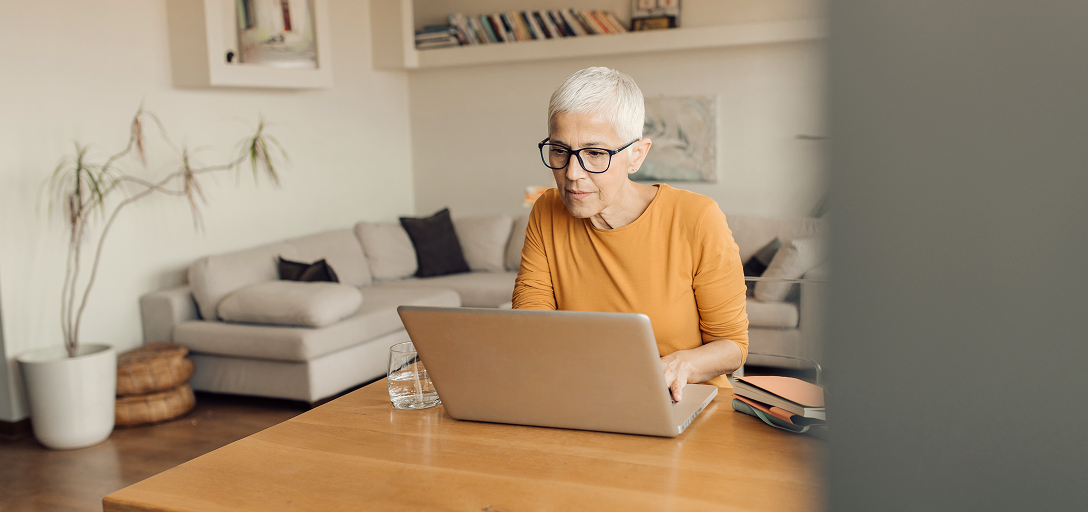 A person at their laptop.