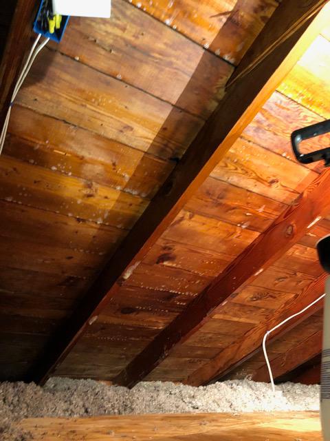 This attic is looking brand new again since our team completed the job.