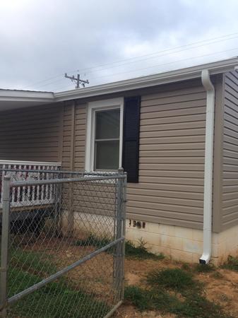 Images Ra Seamless Gutters LLC