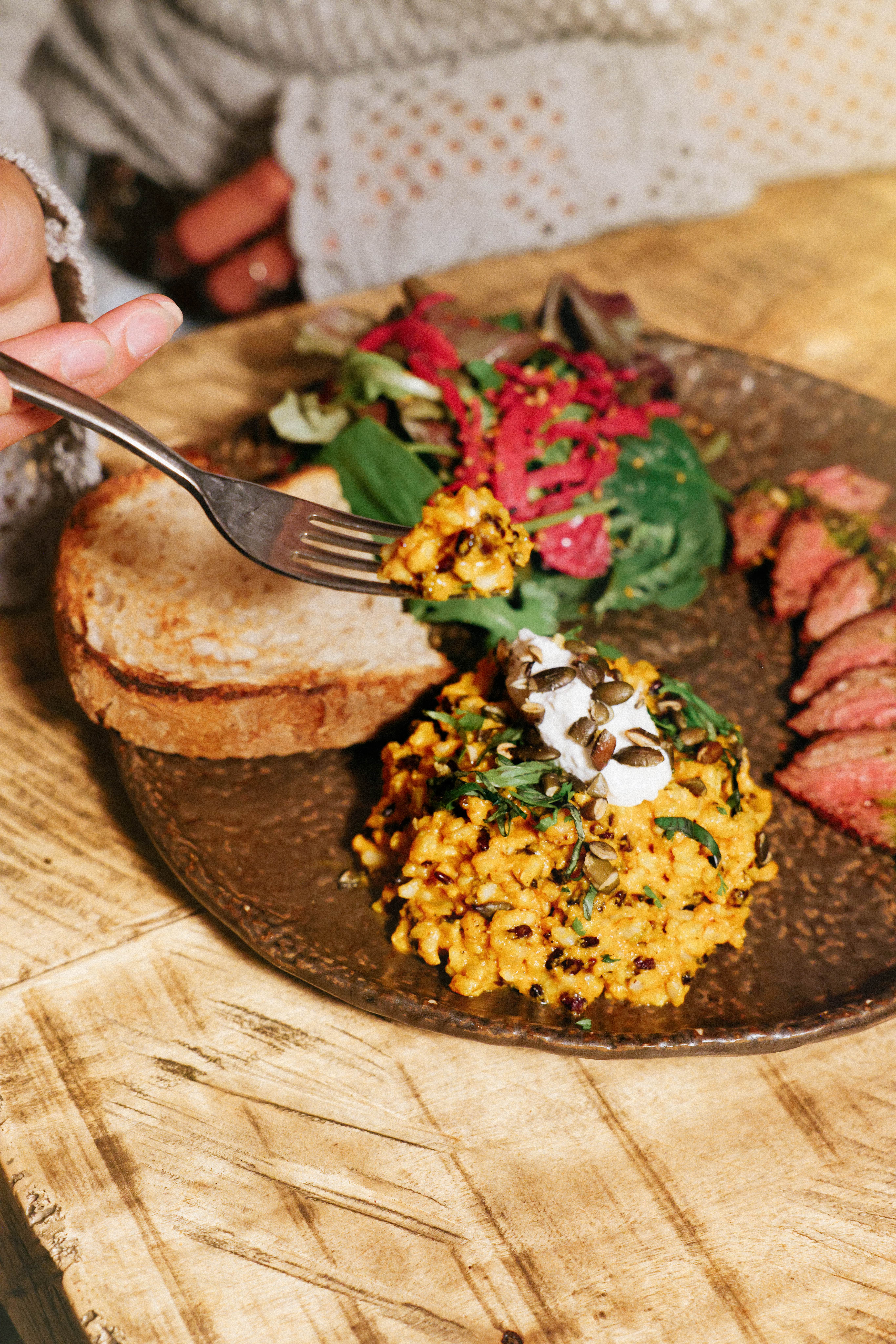 Pumpkin Goat Cheese Rice served with steak chimichurri.