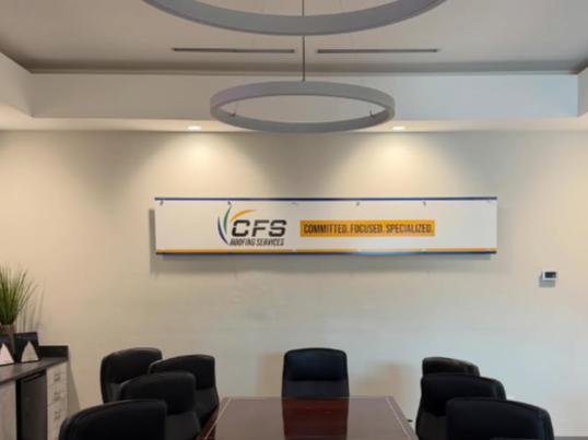 Recently, we had the opportunity to install this custom wall sign in the meeting room of CFS Roofing Services.
Interior signs do more than fill empty wall space, they reinforce your brand, create a professional atmosphere, and leave a lasting impression on clients and team members alike.