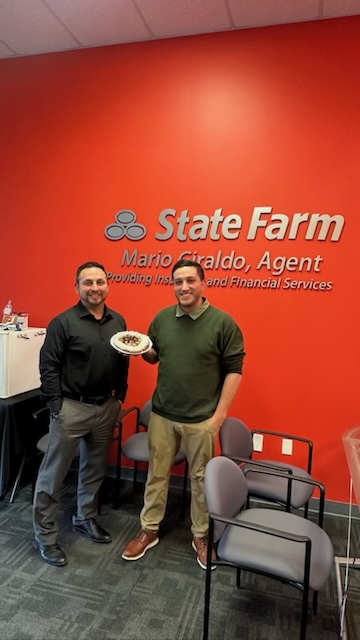 Celebrating the holidays at Mario Giraldo's State  Farm office!