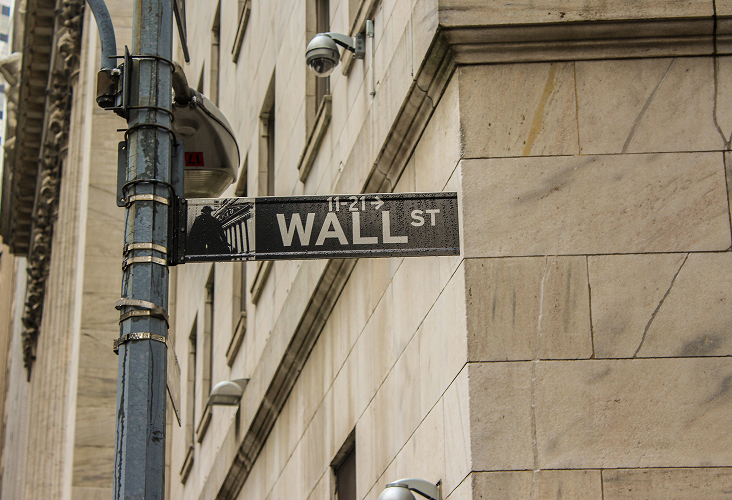 A close-up of a Wall Street sign in New York City.