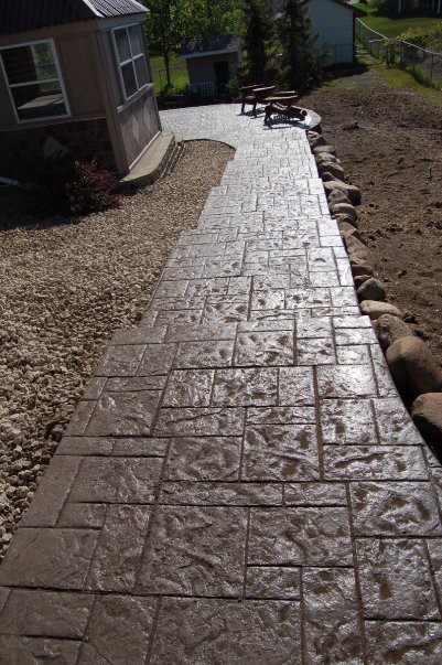 Decorative concrete walkway installation. Upgrade your Maple Grove property today.