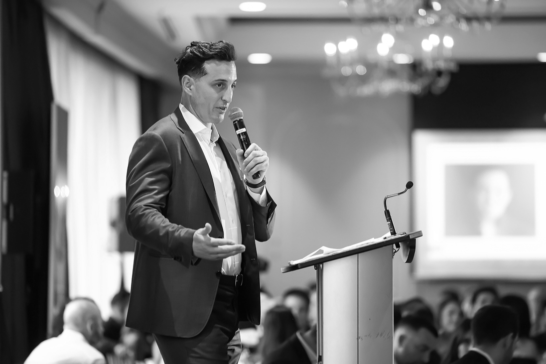 Collin Zwickel giving a speech at the 2024 Zajac Nights Gala.