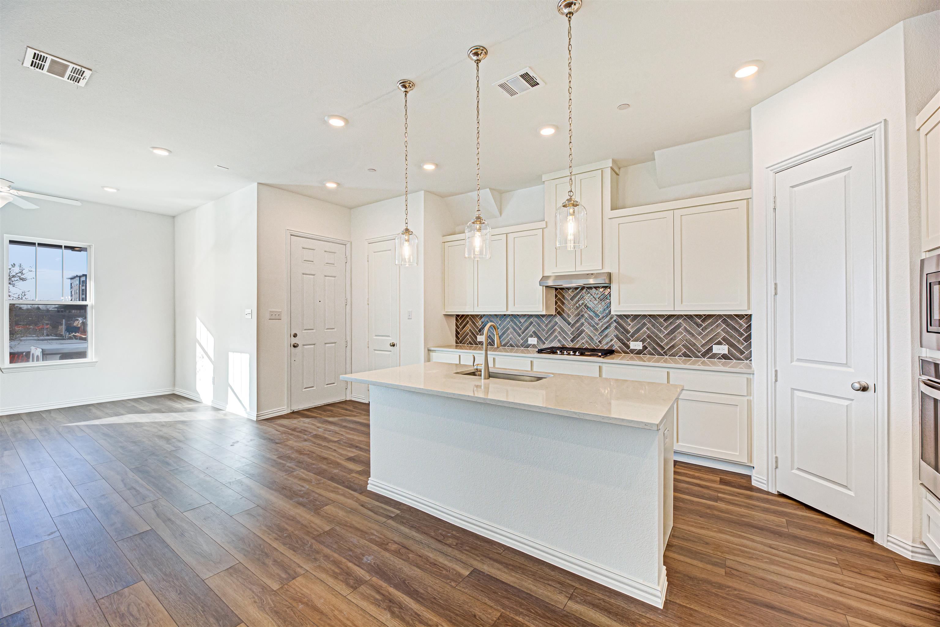 The  Station Townhomes by Ashton Woods in Sachse TX