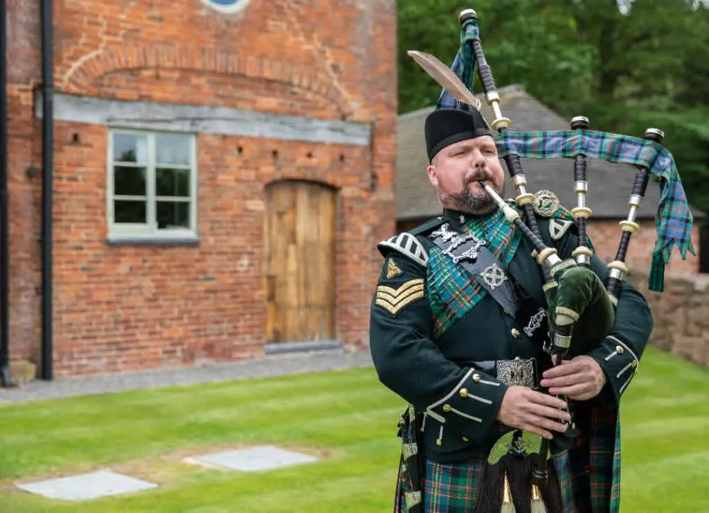 Images Andrew Paton Highland Bagpiper