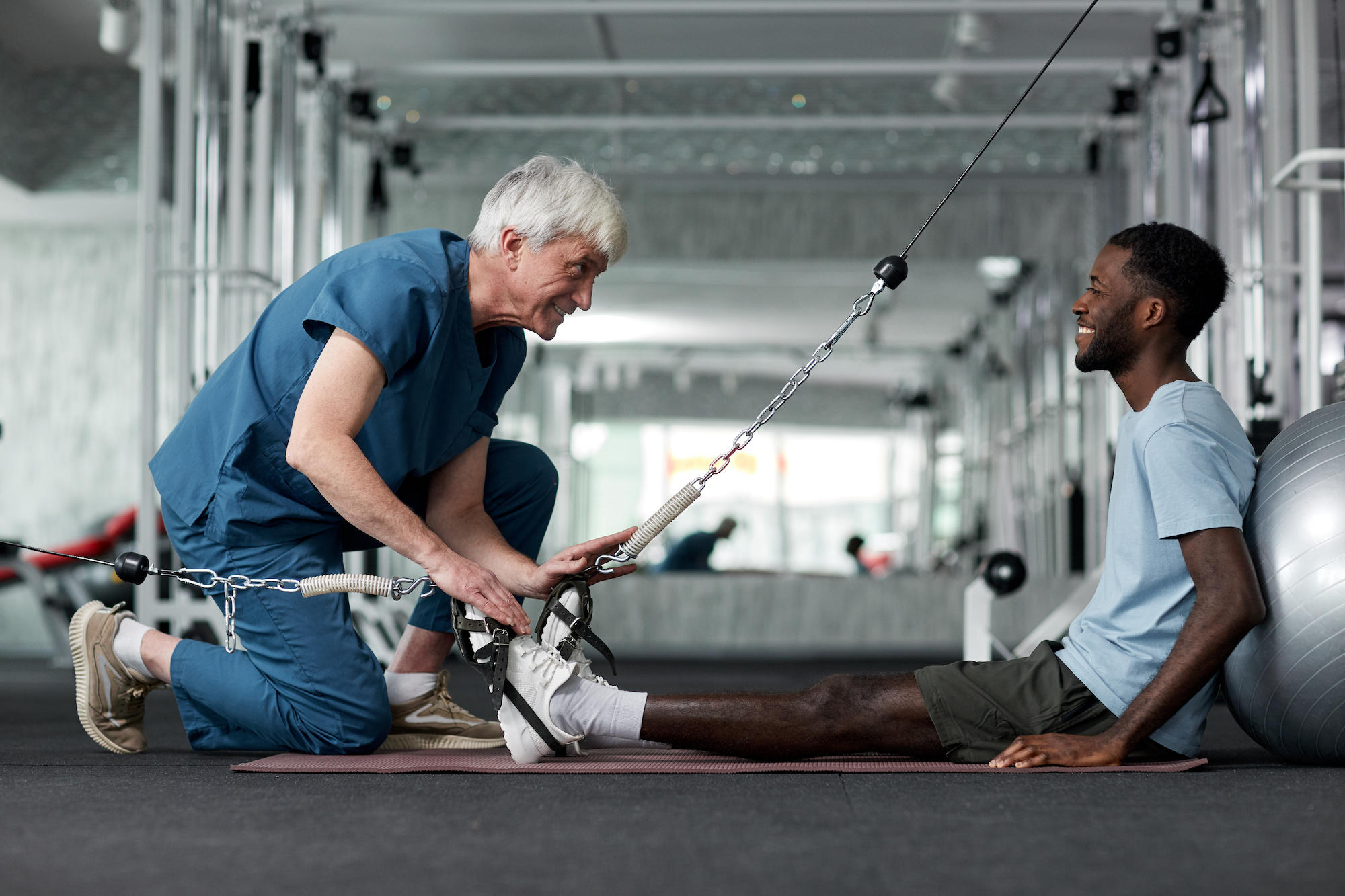 Physical therapist with a patient