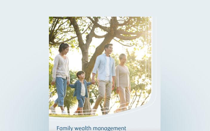 Cover of the family wealth guide with a multigenerational family.