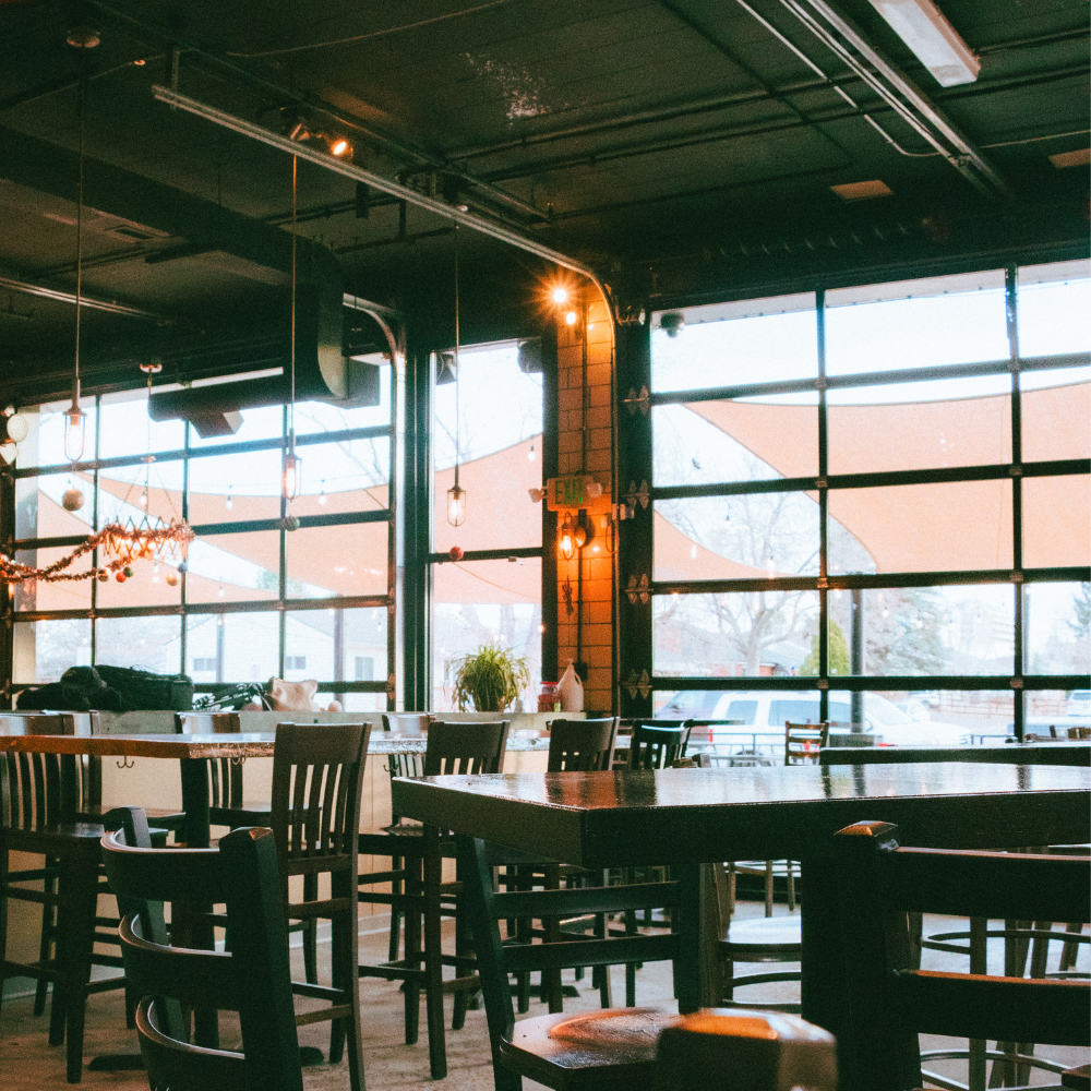 Natural light fills the Station 26 taproom, creating a welcoming space for craft beer and social gat 