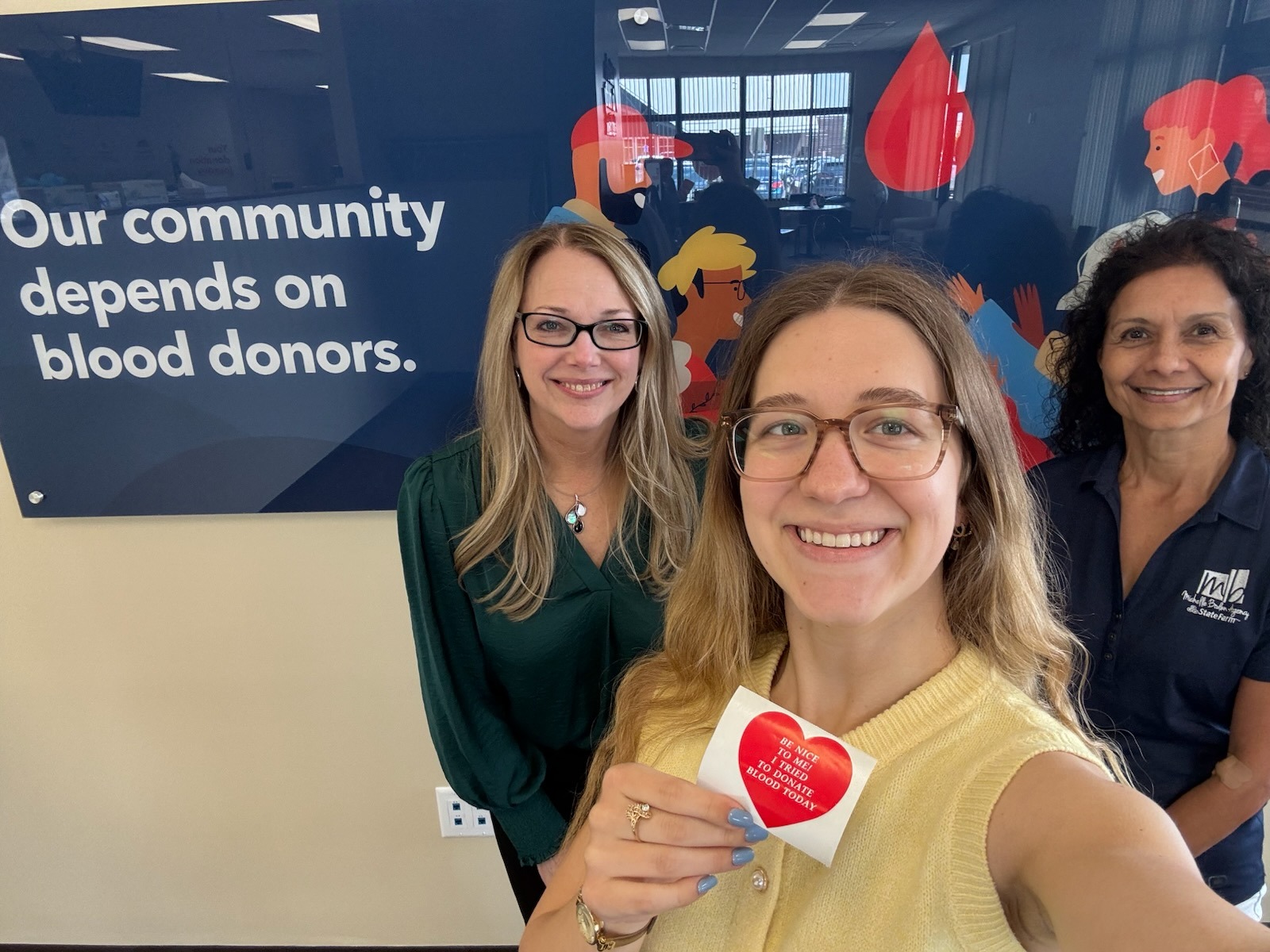 Michelle and Mag donated blood today (and Brooke tried)! We got a coupon for lottery tickets just for showing up, so make sure to stop by a blood bank soon to score one as well. It's always a great day to save lives