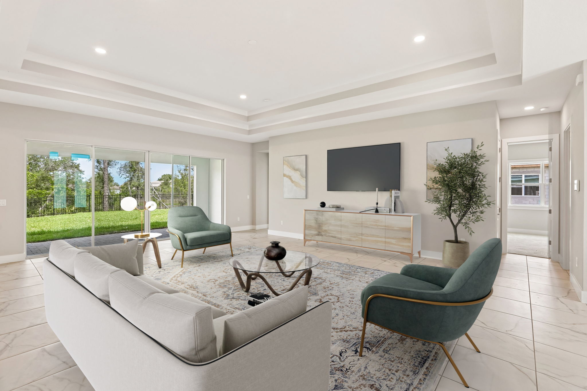 The Living Room of a DRB Homes Sabal Home Plan at Serengeti in Spring Hill, FL. 