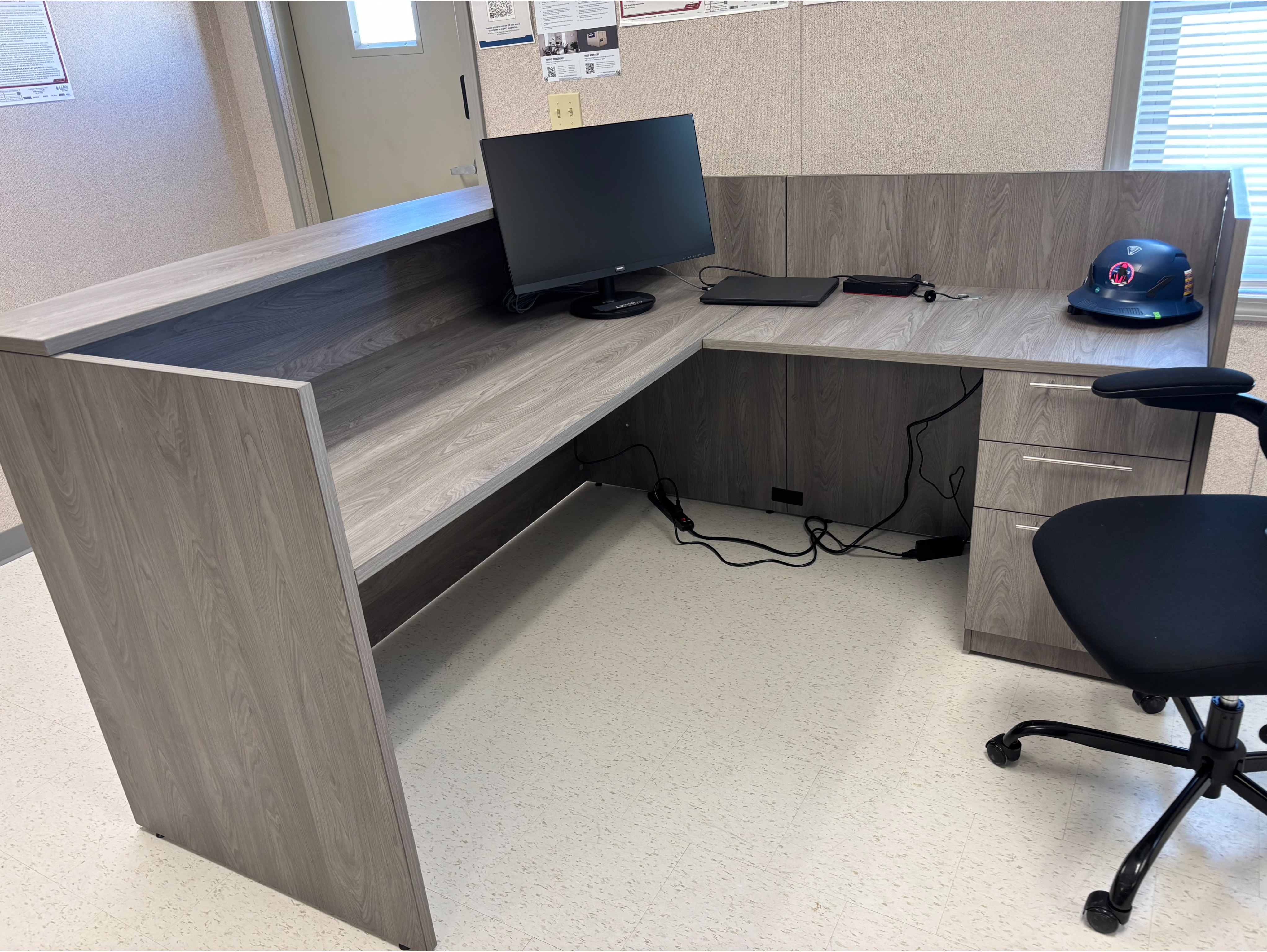 Compact Training Room Tables:

Modular, nesting office tables and stackable ergonomic chairs arranged for versatile office training room configurations.