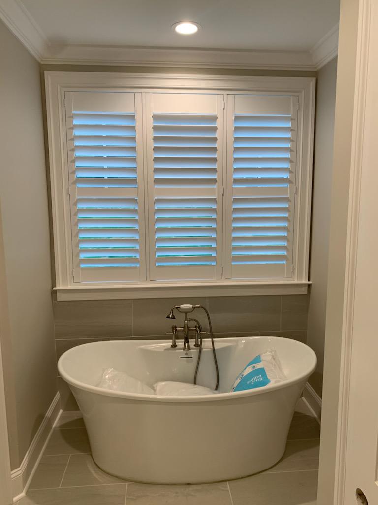 These shutters are gorgous in a bathroom!