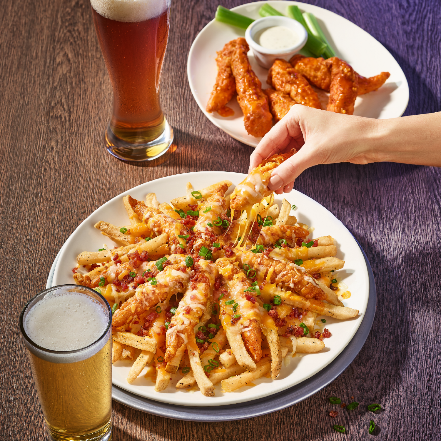 A Zingers Mountain Melt® and a plate of Zingers® paired with ice cold beer