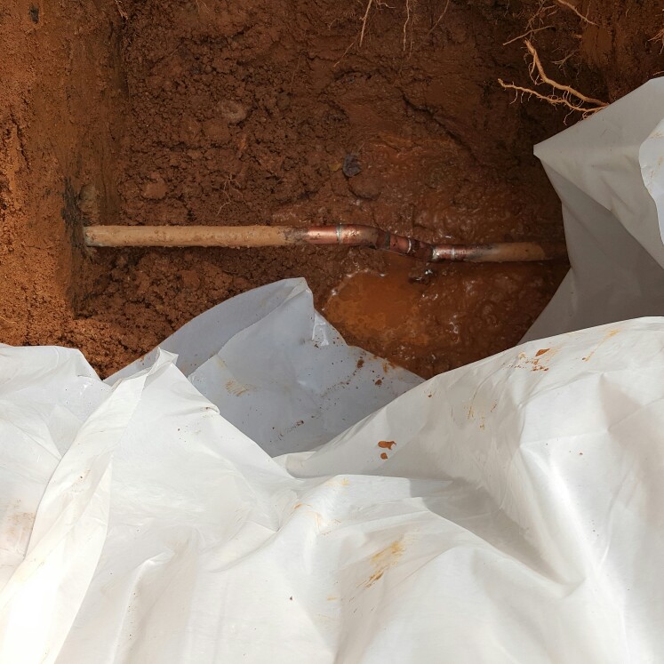 water leak repair outside of home. 2' underground.
pipe had broken we repaired with 45 degree elbows to allow better water flow verses 90s