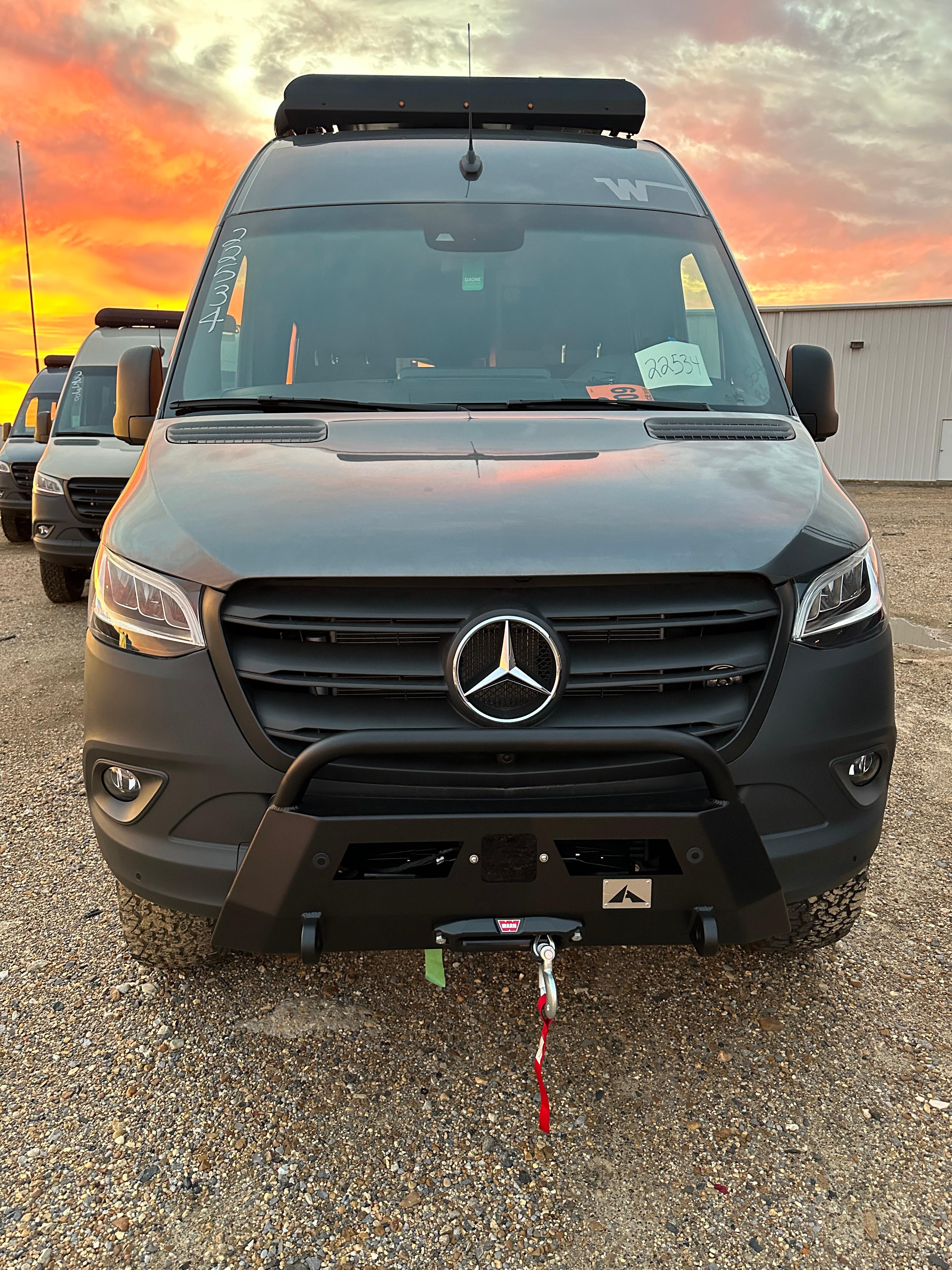 Upfitted Winnebago Revel on 144 Sprinter 4x4 Backwoods Adventure Mods front bumper with winch, S&B 40 gallon fuel tank, Agile Offroad RIP kit lift, Black Rhino wheels.