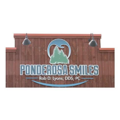 Ponderosa Smiles; Rob D. Lyons D.D.S. Logo