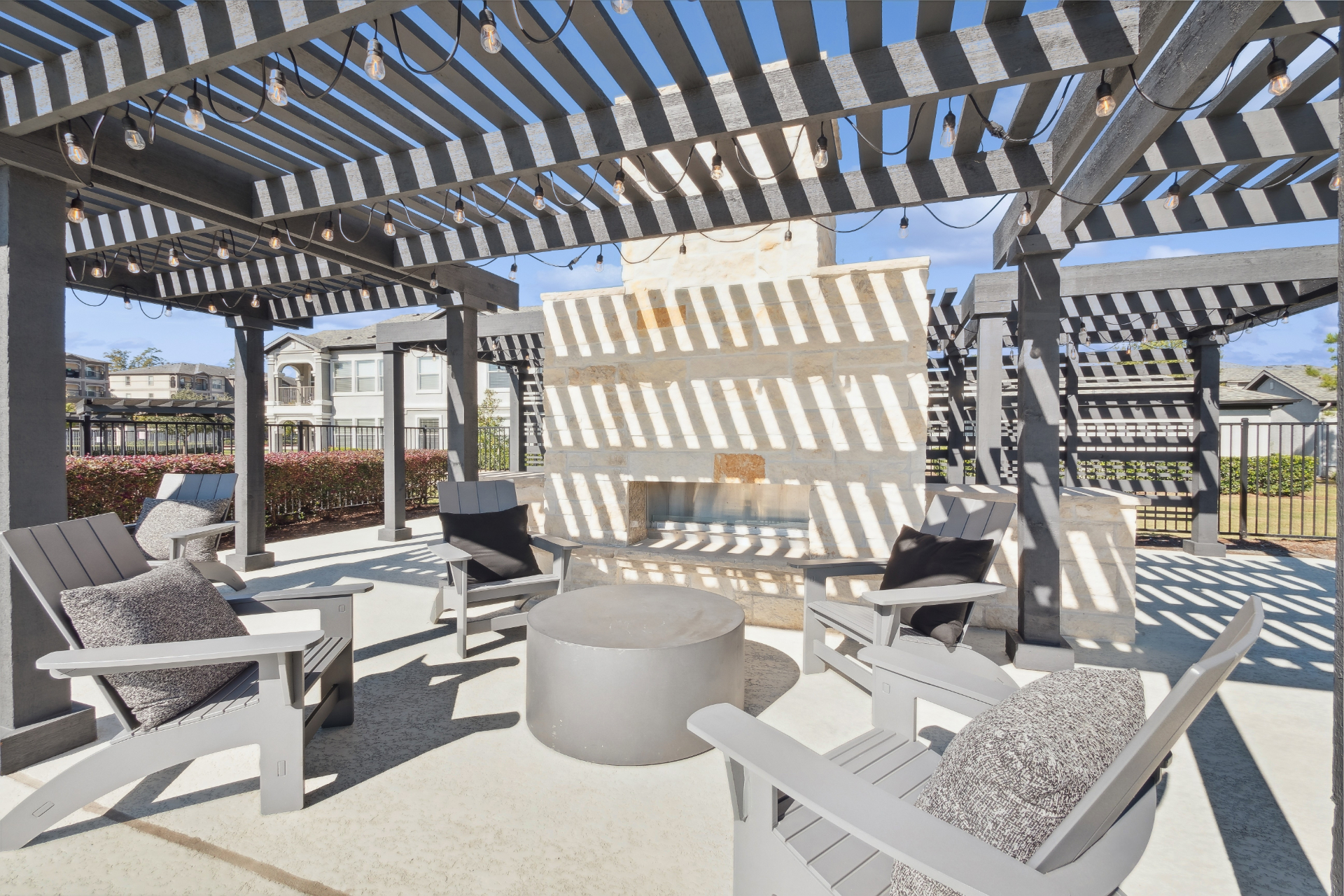 Trellis-Covered Outdoor Kitchen & Conversational Fireplace Lounge