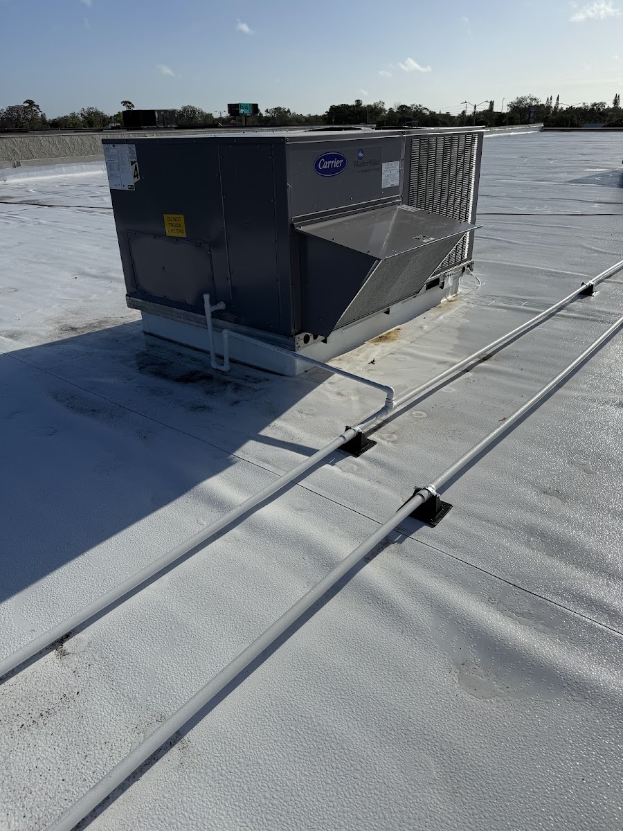 Commercial rooftop HVAC package unit installed on a flat roof to provide dependable heating, cooling, and airflow.