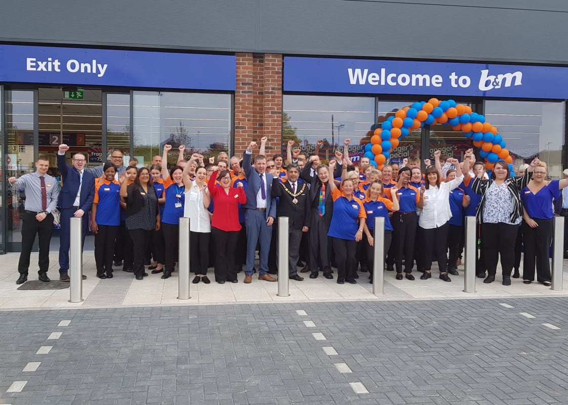 B&M Clifton's store team celebrate the opening of their brand new store on Green Lane.