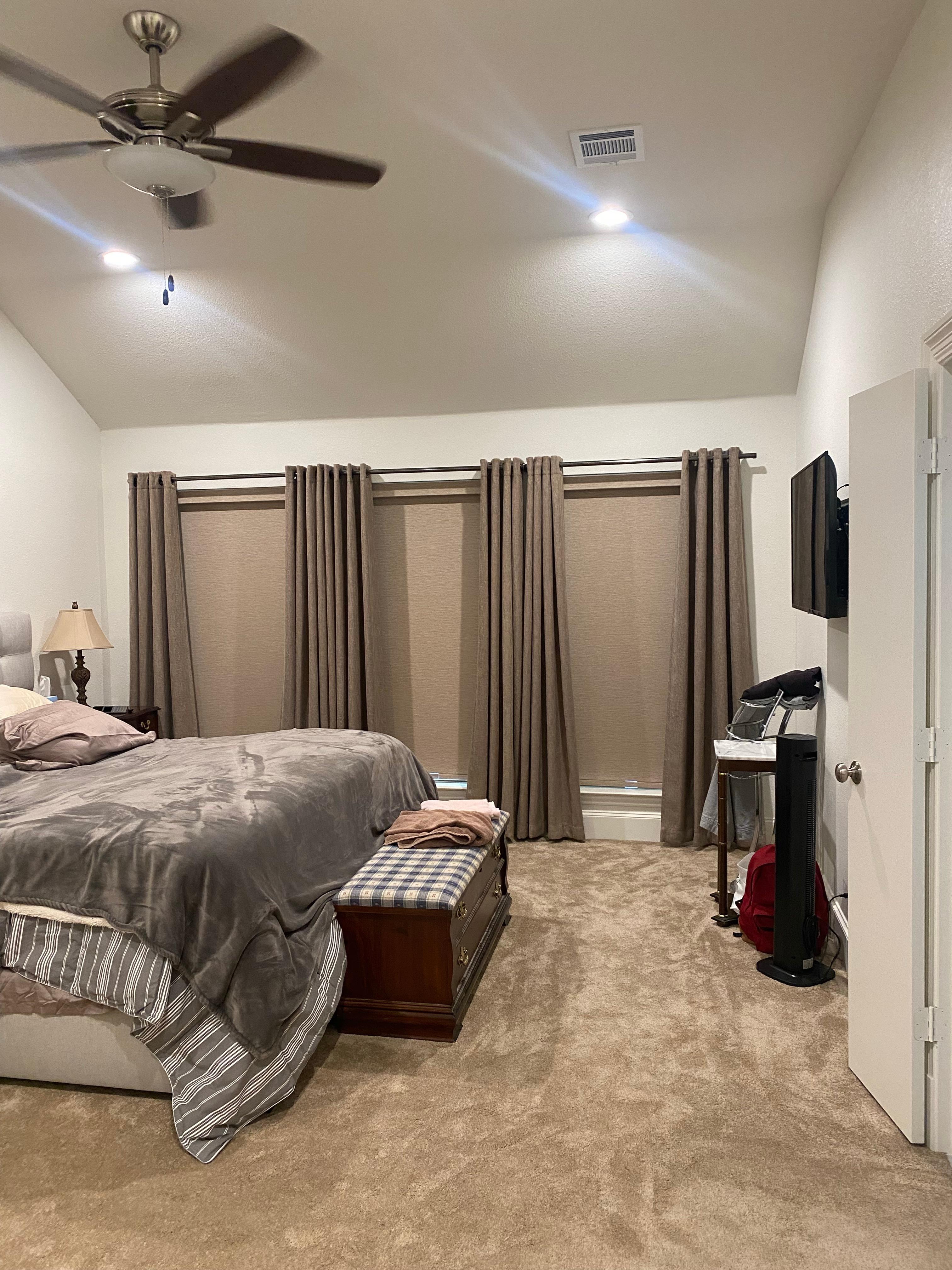 We paired cordless roller shades with drapery deco panels in our clien’t master bedroom in Rockwall, TX.