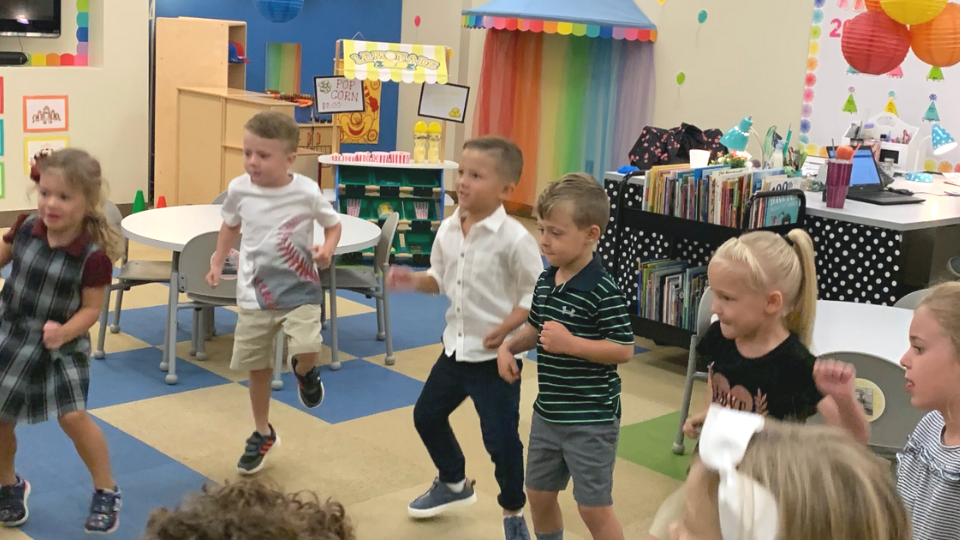 Lincoln Christian School pre-school elementary students singing dancing in the classroom