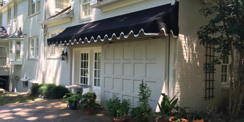 FABRIC AWNINGS CAN PROVIDE SHADE AND INTEREST TO YOUR PROPERTY.