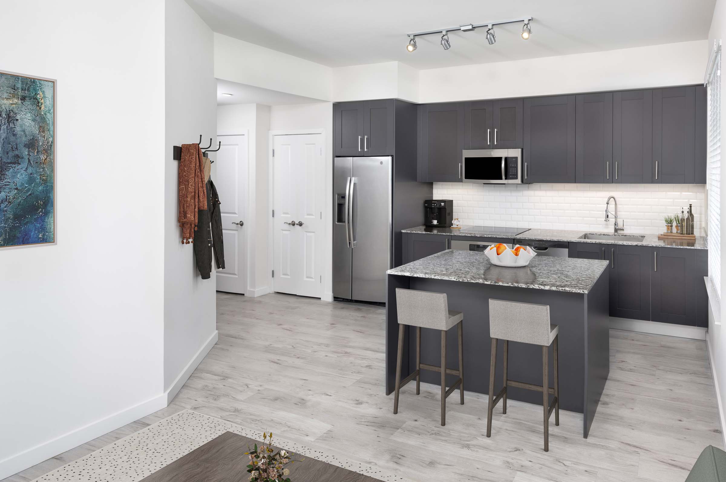 Kitchen in studio floor plan at Camden Central high-rise apartments in St. Petersburg, FL