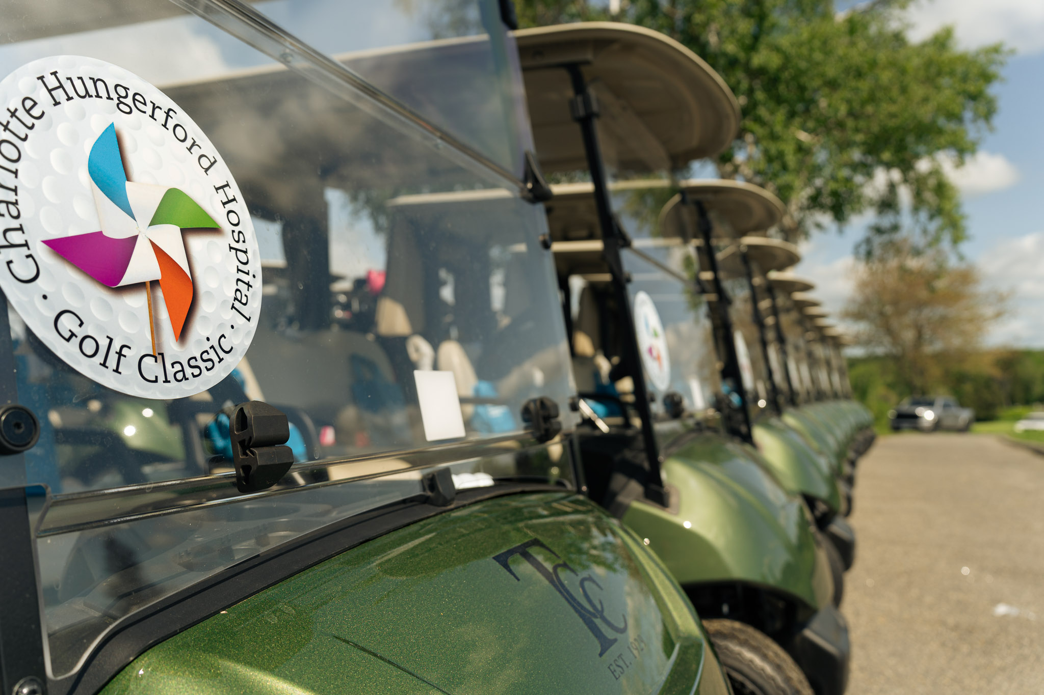 Custom event decals produced by Sign Pro and applied to golf carts for the Charlotte Hungerford Hospital Golf Classic.