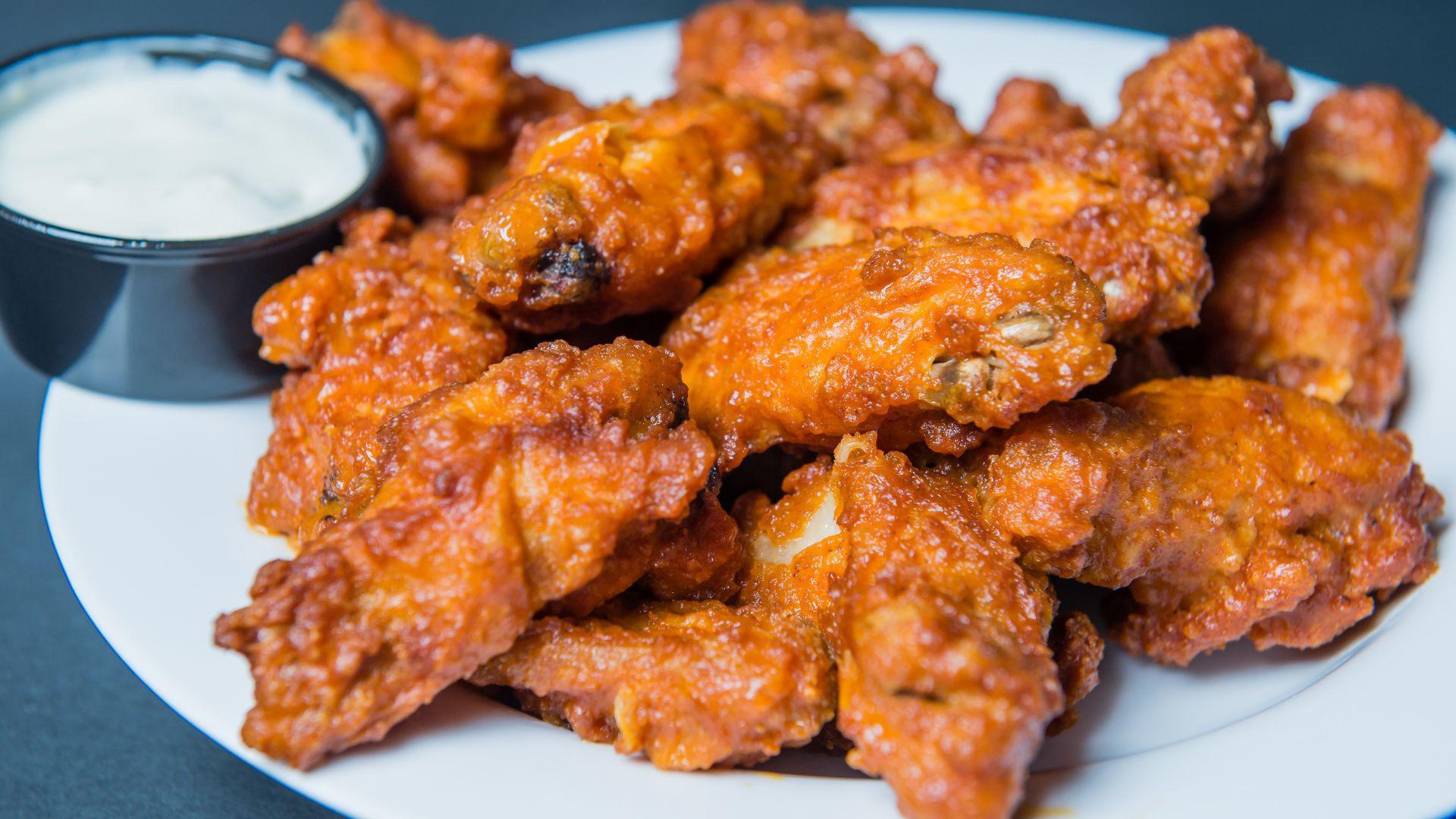 Hot Wings from Yellow Submarine in Nags Head. Choose from Boneless or Regular with Hot, Mild, BBQ, Honey BBQ, or Garlic Parmesan sauce. Served with homemade Buttermilk Ranch or Blue Cheese.