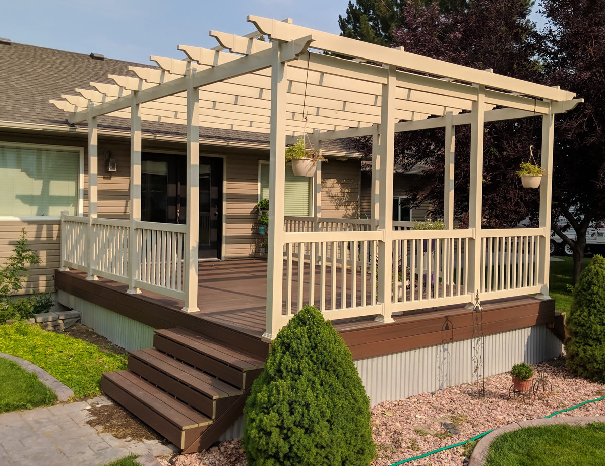 Enhance your backyard's comfort and style with a custom-built tan vinyl pergola and composite deck from DeckPro LLC. This low-maintenance outdoor living space is perfect for relaxing in the shade and entertaining guests, complete with matching railings and durable materials that stand the test of time.