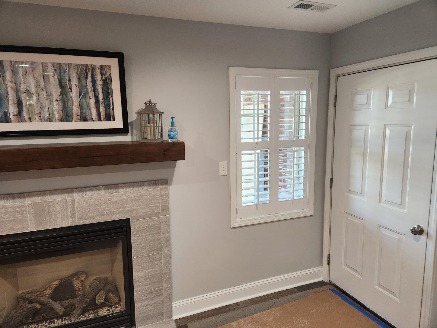 The shutters offer a classic, clean look to this serene space, blending seamlessly with the crisp li Budget Blinds of Knoxville & Maryville Knoxville (865)588-3377
