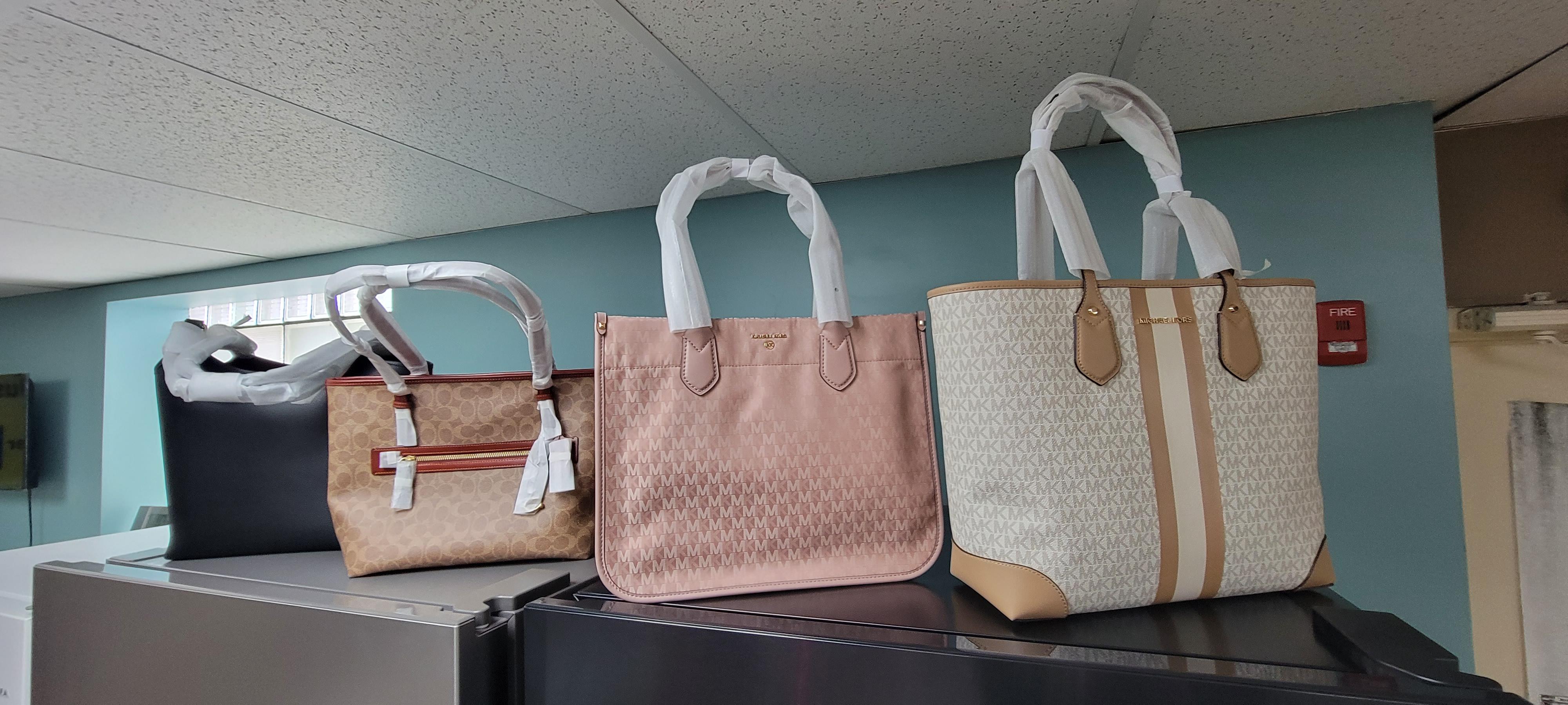 Handbags from Michael Kors and Coach