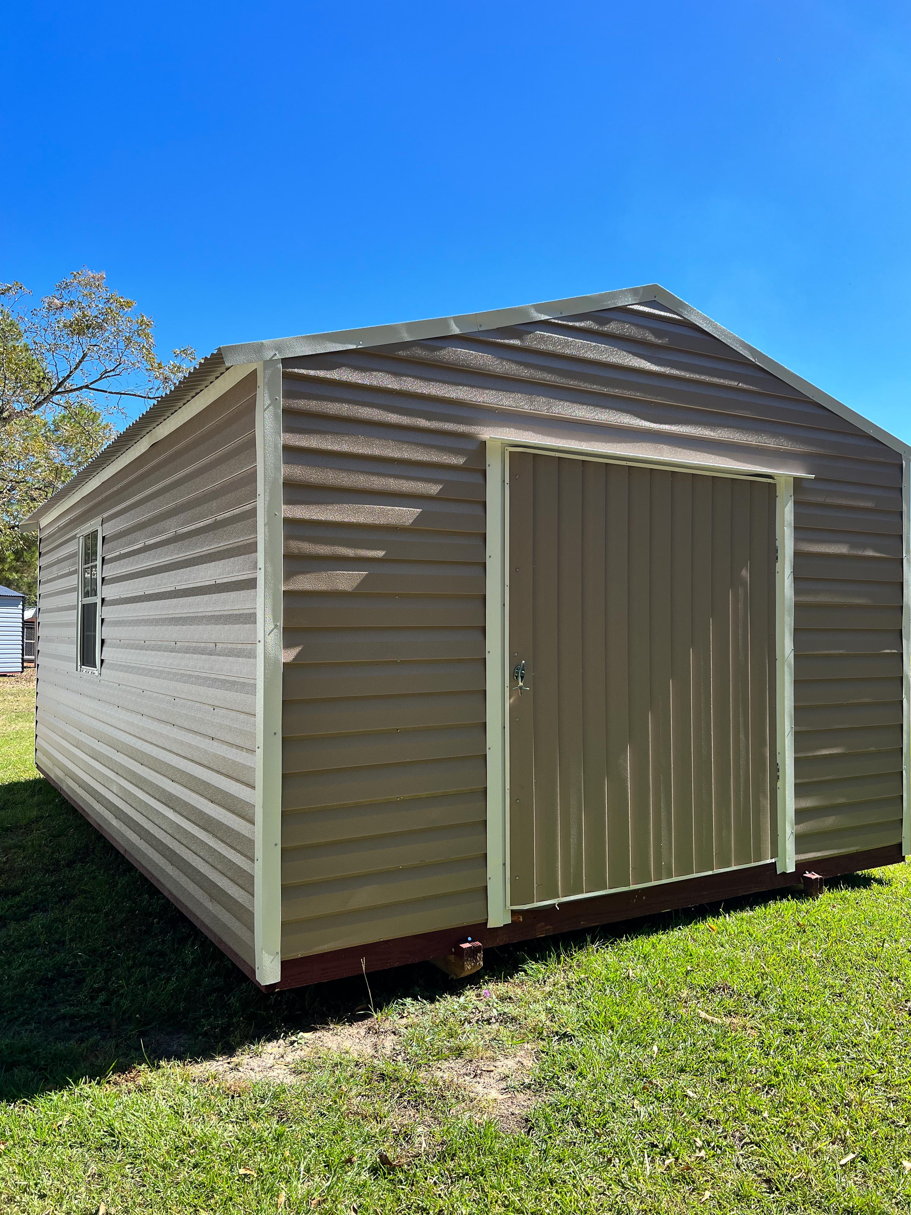 Portable shed with larger door and window