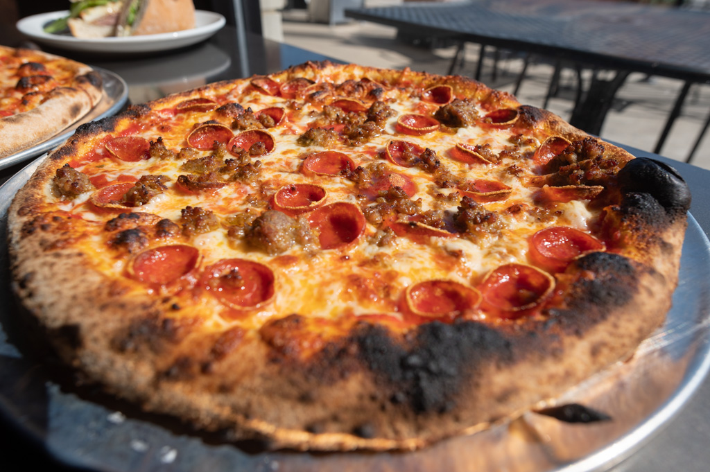 Traditional wood fired pepperoni and sausage pizza. meaty with our crispy light crust.