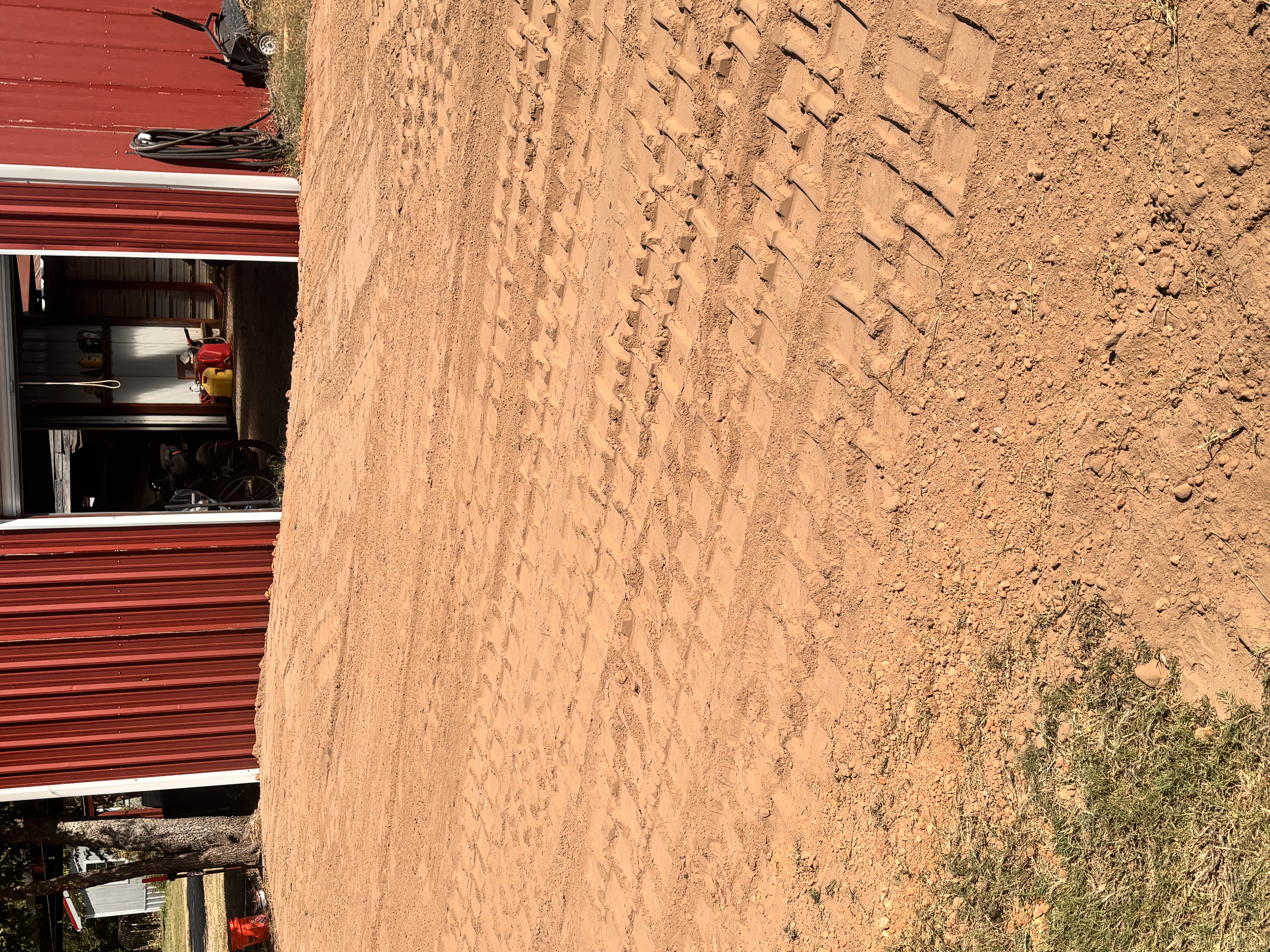 Built up a very low spot at door and sloped the water away from the door!!