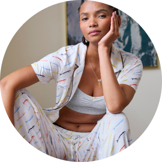 Woman wearing pajamas.