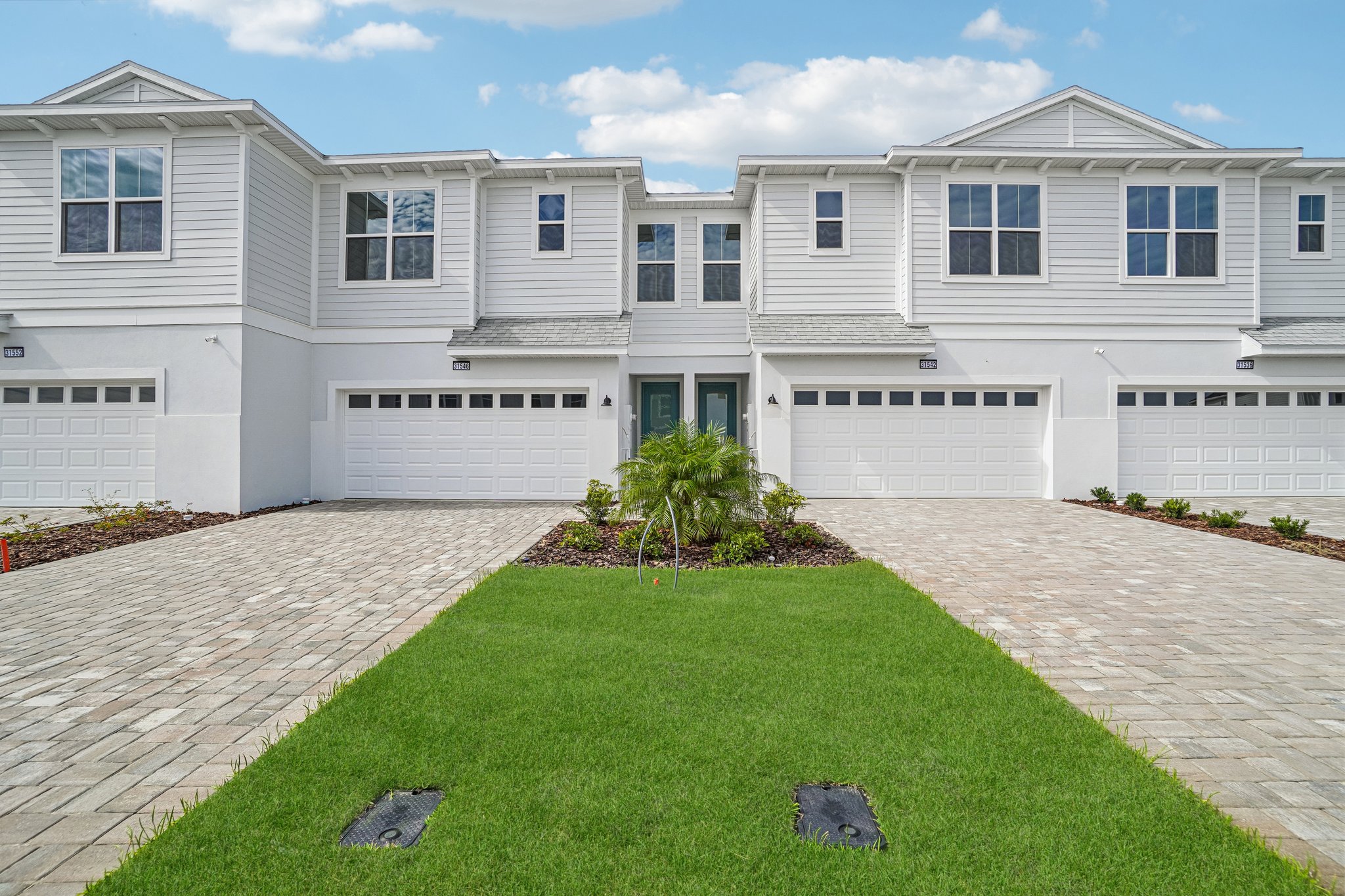 The Front Elevation of a DRB Homes Aruba Quick Move-In Home  at Isla Mirada in San Antonio, FL. 